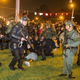 Baton Rouge, La., police rush a crowd of protesters and start making arrests July 9, 2016. Protests were a result of the fatal police shooting of Alton Sterling outside a convenience store July 5, 2016.
Mark Wallheiser/Getty Images